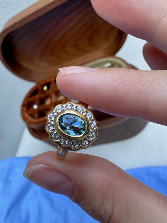 Sweet Blue Topaz Halo Gold Daisy Ring