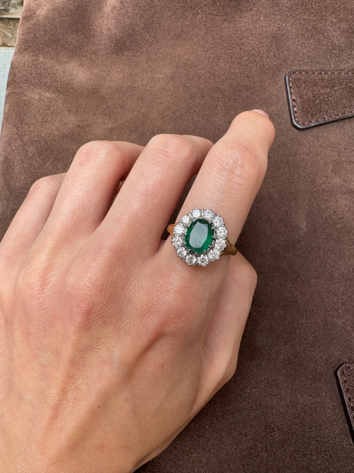 Oval Emerald and Diamond Halo ring
